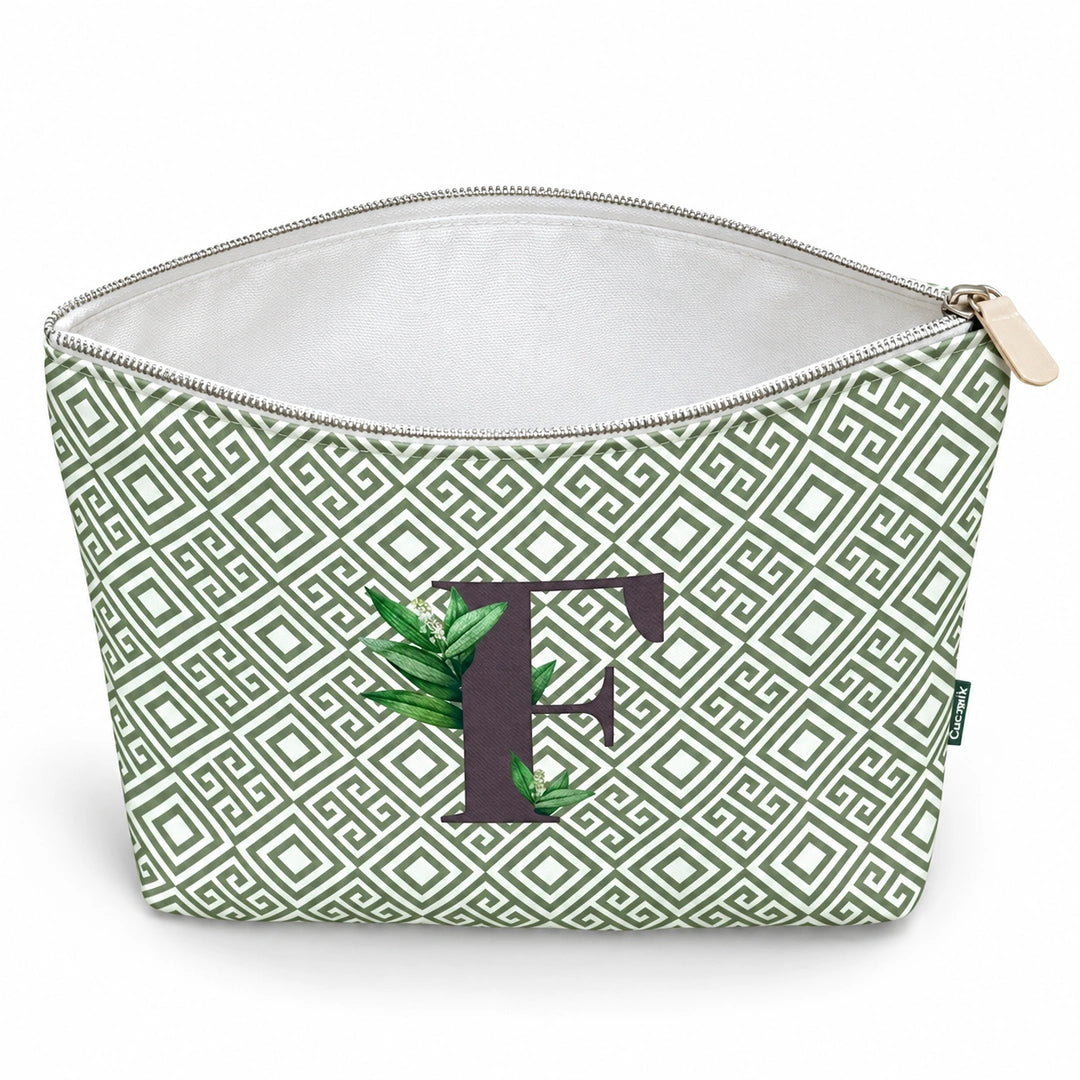 Bolsa Guta verde letra F — aberta e vazia, interior branco sem forro e sem divisórias