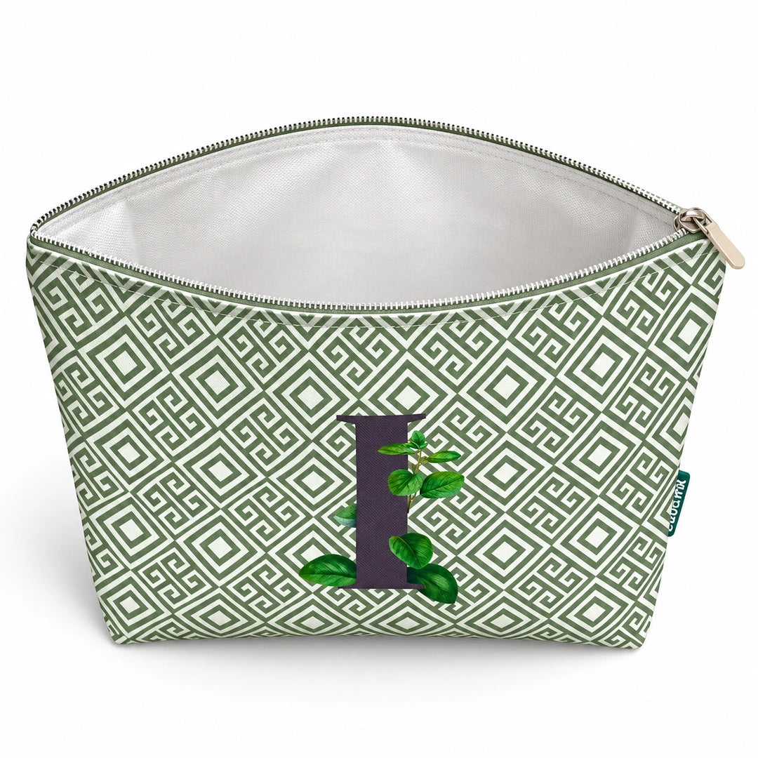 Bolsa Guta verde letra I — aberta e vazia, interior branco sem forro e sem divisórias