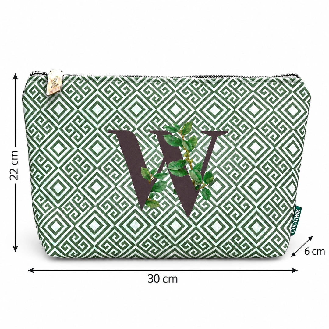 Bolsa Guta verde letra W com medidas 30 × 22 × 6 cm.
