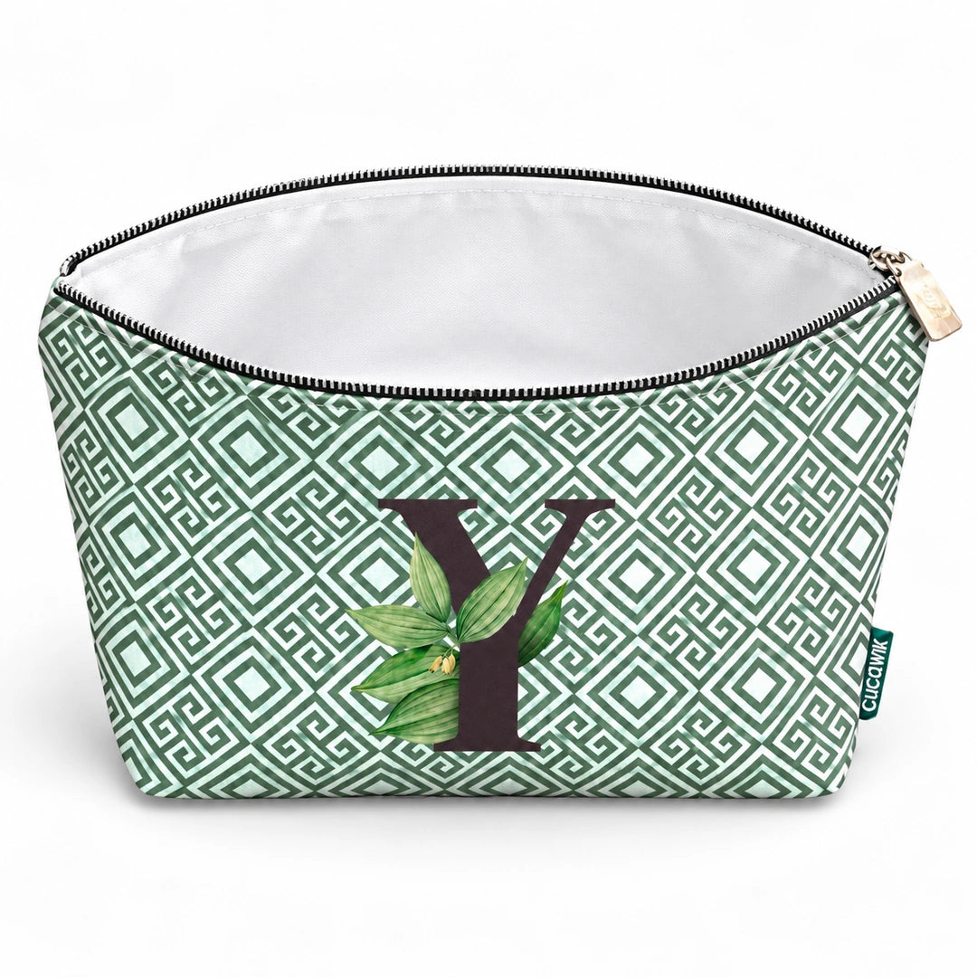 Bolsa Guta verde letra Y aberta e vazia, interior branco sem forro e sem divisórias.