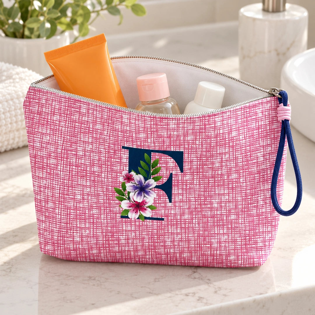 Bolsa Vera rosa letra F — aberta em utilização, com interior branco