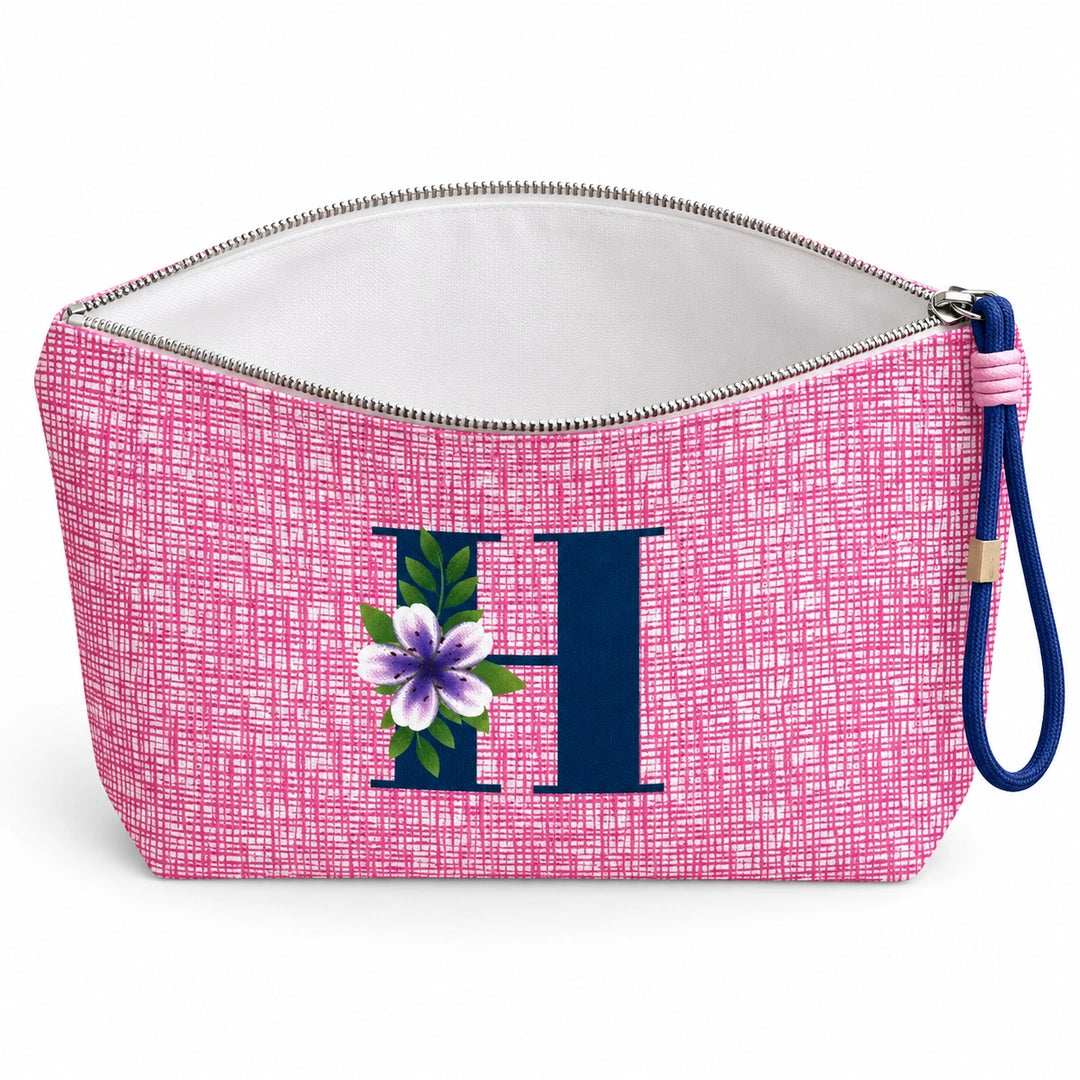 Bolsa Vera rosa letra H — aberta e vazia, interior branco sem forro nem divisórias