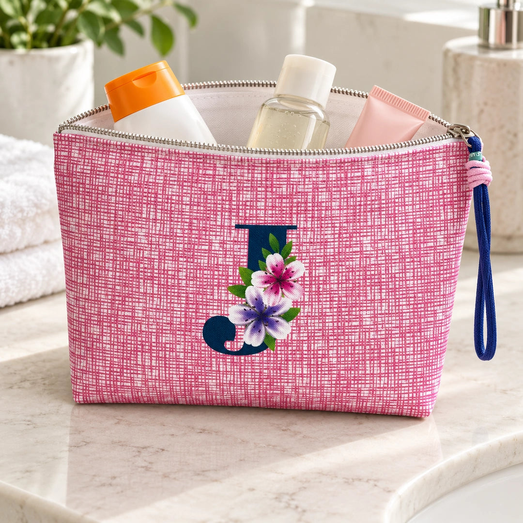 Bolsa Vera rosa letra J — aberta em utilização, com interior branco