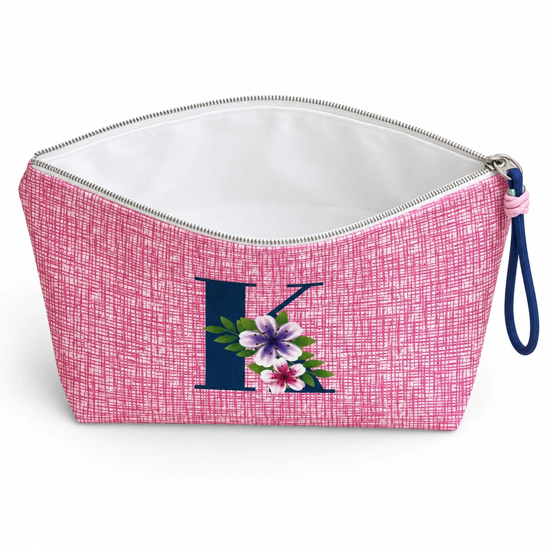 Bolsa Vera rosa letra K — aberta e vazia, interior branco sem forro nem divisórias