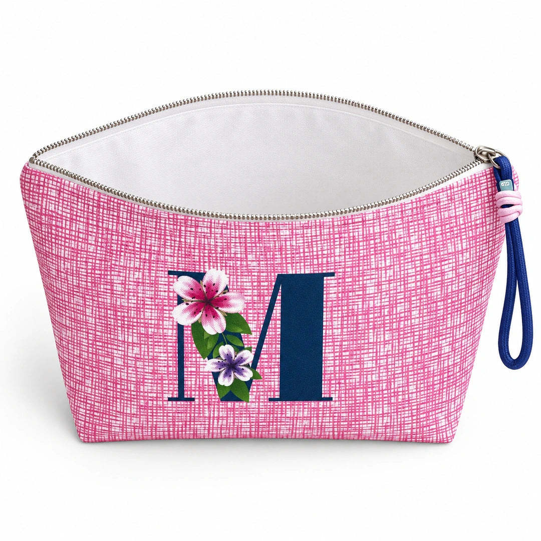 Bolsa Vera rosa letra M — aberta e vazia, interior branco sem forro nem divisórias