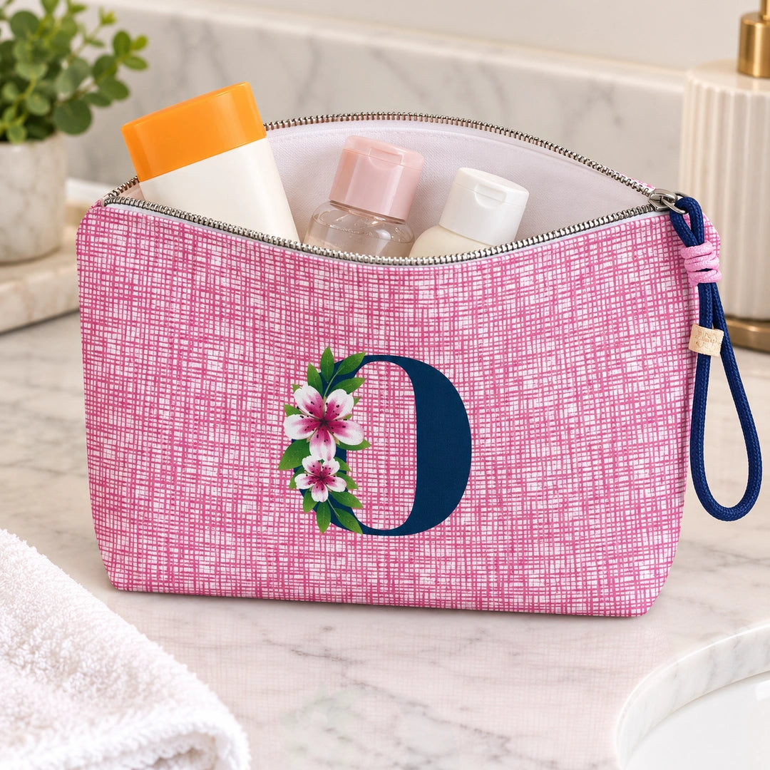 Bolsa Vera rosa letra O — aberta em utilização, com interior branco