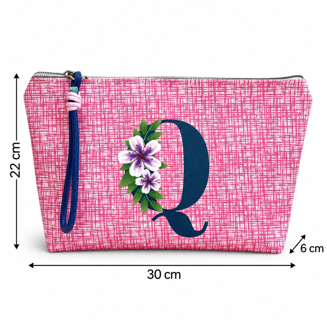 Bolsa Vera rosa letra Q — medidas 30 × 22 × 6 cm.