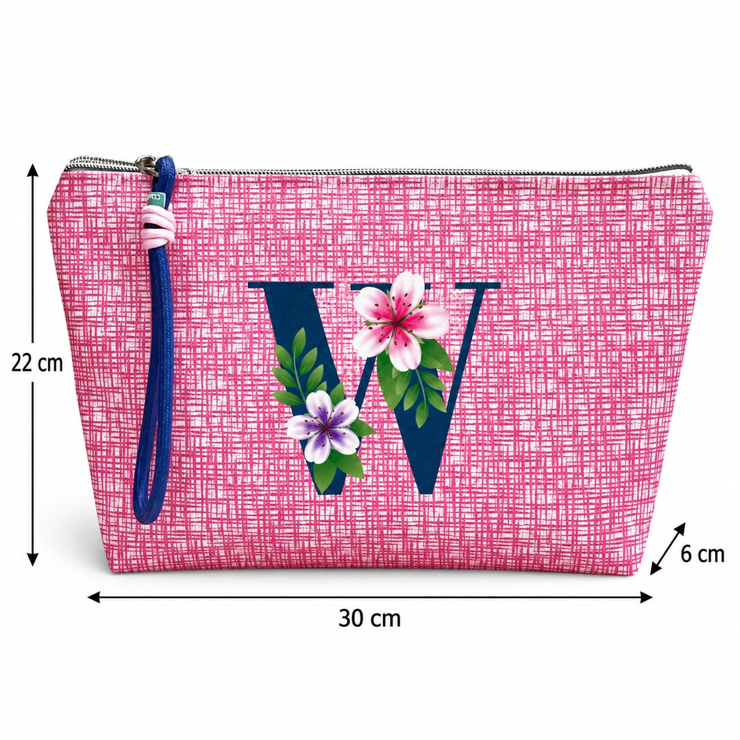 Bolsa Vera rosa letra W — medidas 30 × 22 × 6 cm.