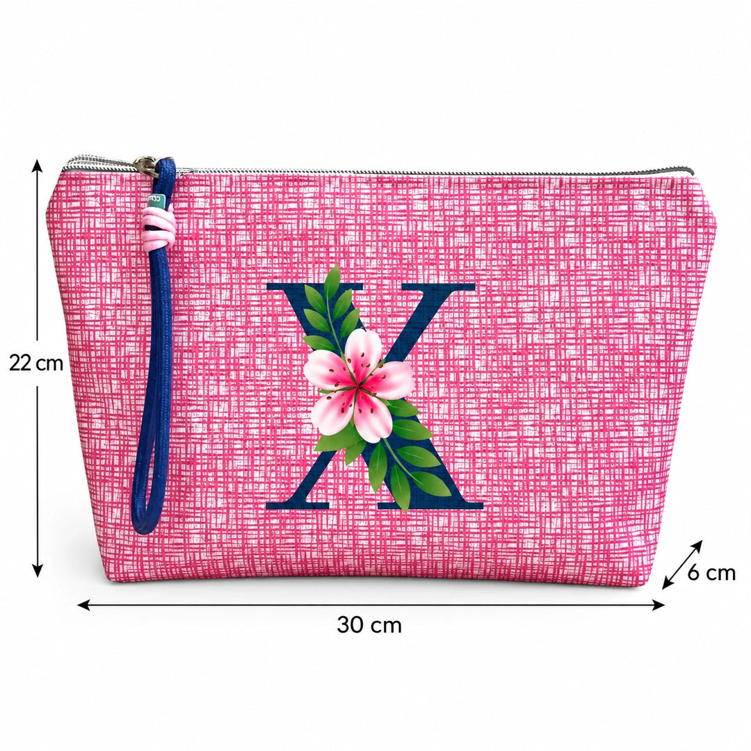 Bolsa Vera rosa letra X — medidas 30 × 22 × 6 cm.